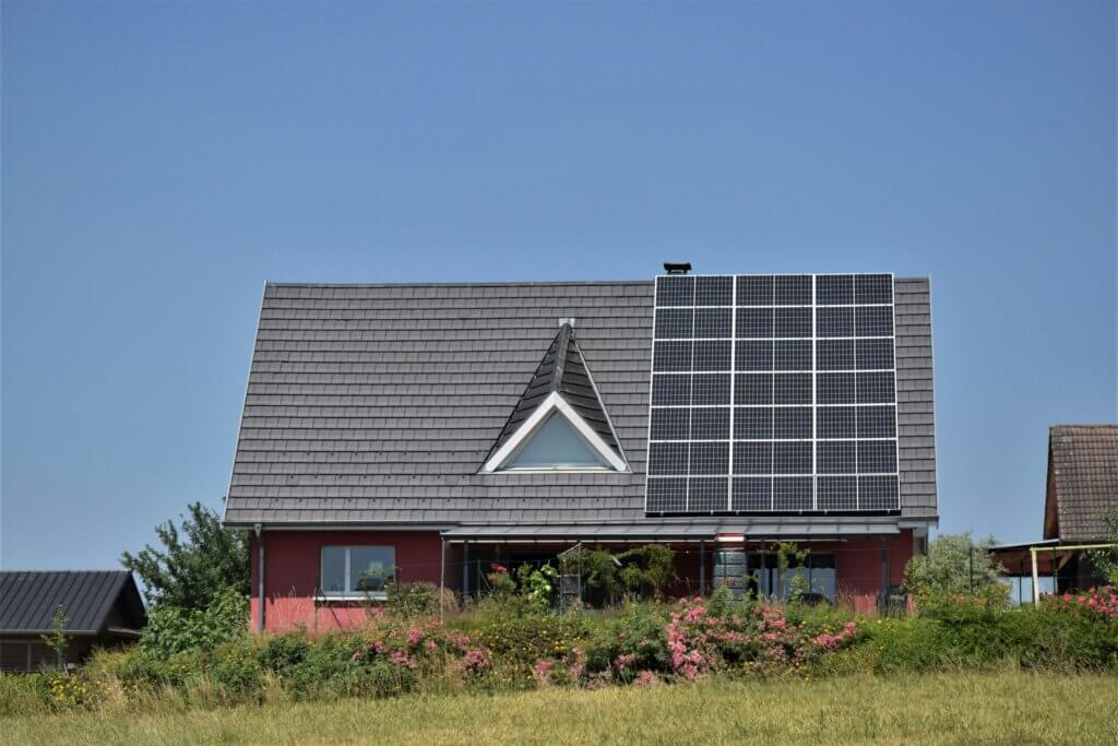 New Jersey home with rooftop solar panels, showcasing the long-term financial and environmental benefits of solar investment.